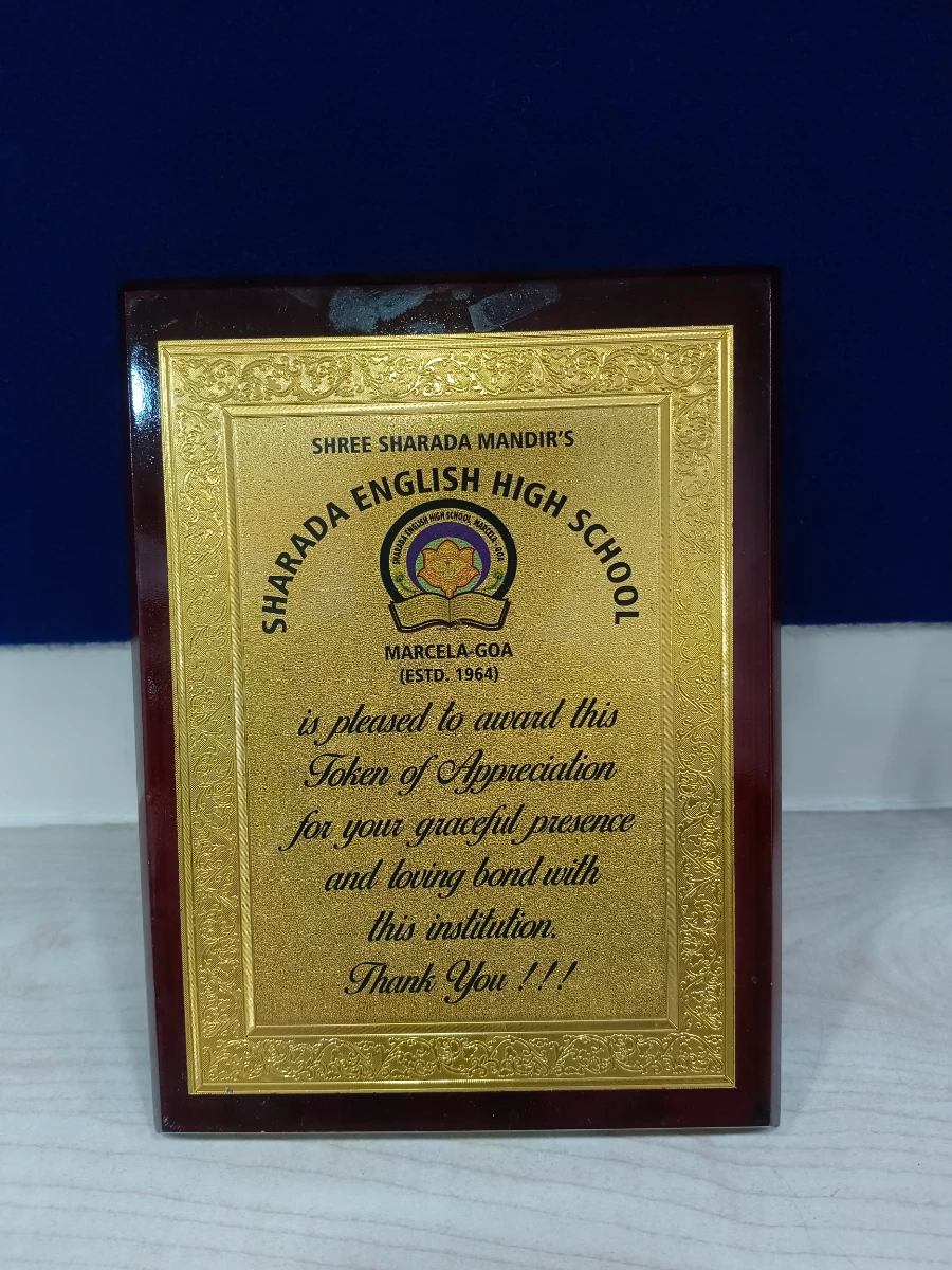 Token of appreciation award from Sharada English High School